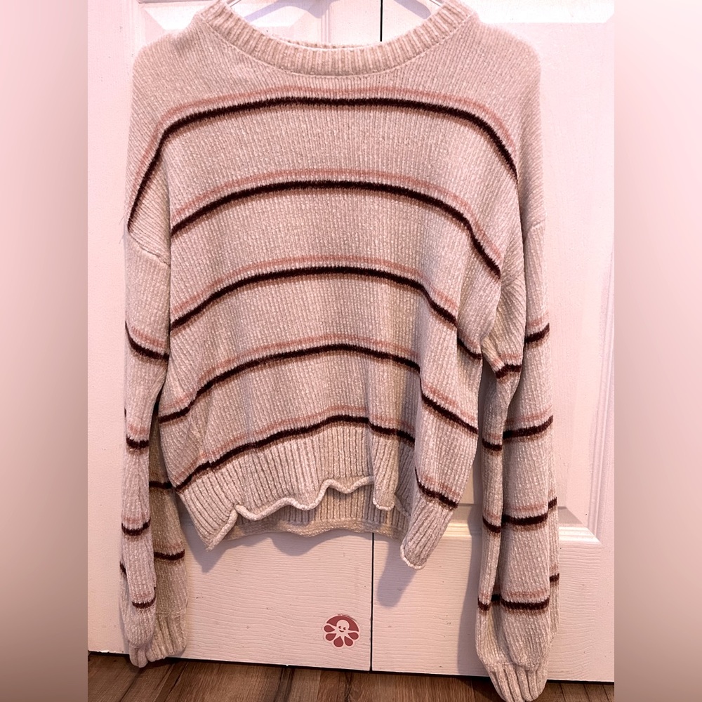 A nice cute sweater, cloud chaser, and size medium